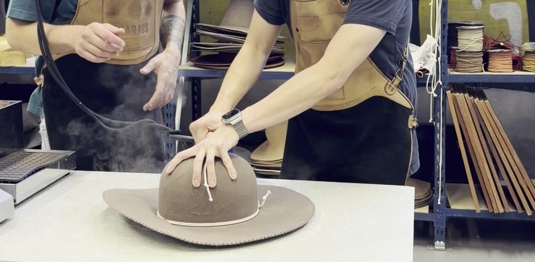 Shaping the crown by hand, with steam, at Rui's bench